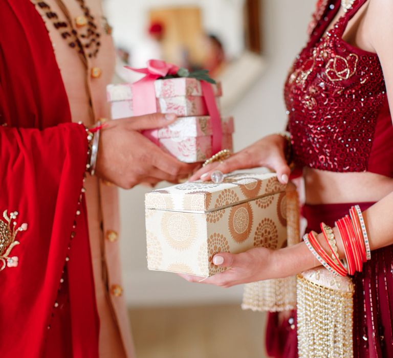 Bride & groom exchange gifts