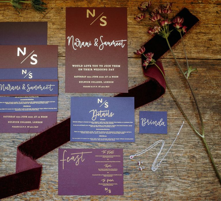 Burgundy and purple jewel coloured wedding stationery suite with braille menu card