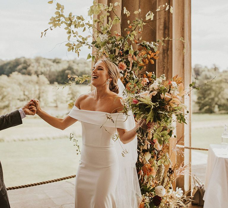 Bride & groom celebrate and sing on their wedding day