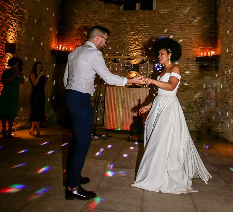 Bride & groom dance during reception on their wedding day