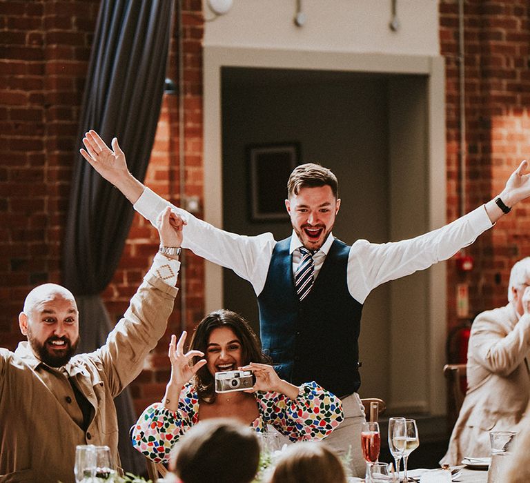 Wedding guests dance on the day of wedding during reception