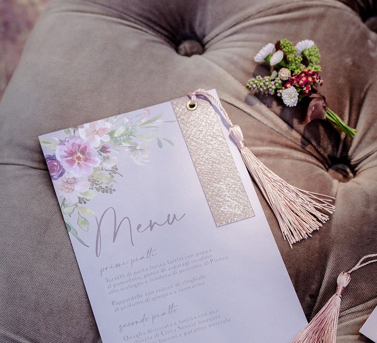 Wedding menu stationery in lavender complete with tassel to the side 