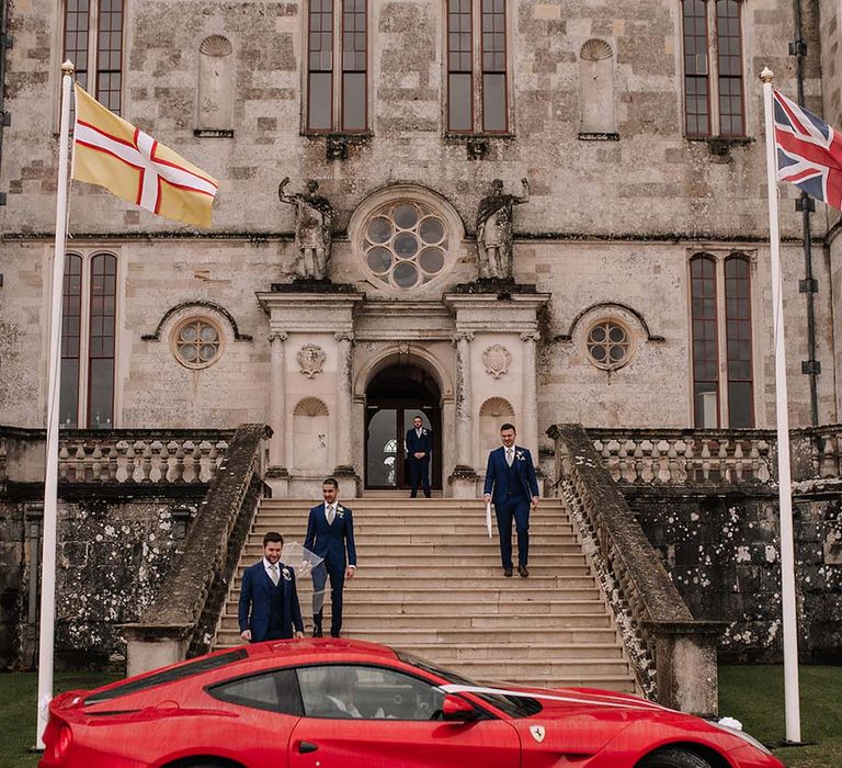 Red Ferrari wedding car transport to the wedding venue in Dorset 