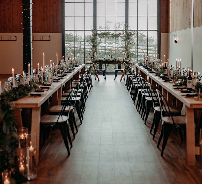 Upton barn wedding venue with edison bulb lighting and candles