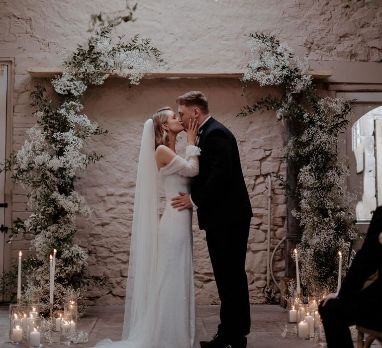 Monochrome black and white Wyresdale Park wedding with white winter wedding flower column decorations 