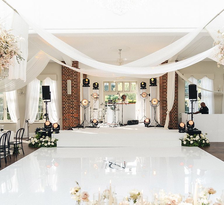 Offley Place wedding reception with white drapery and monochrome decor