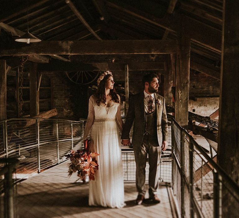 Thwaite Mills and Northern Monks Brewery wedding with bride in boho lace wedding dress with flower crown and groom in brown suit 