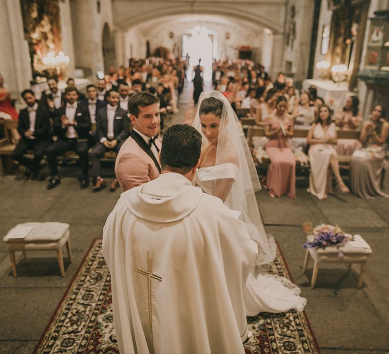 Priest at church wedding ceremony 