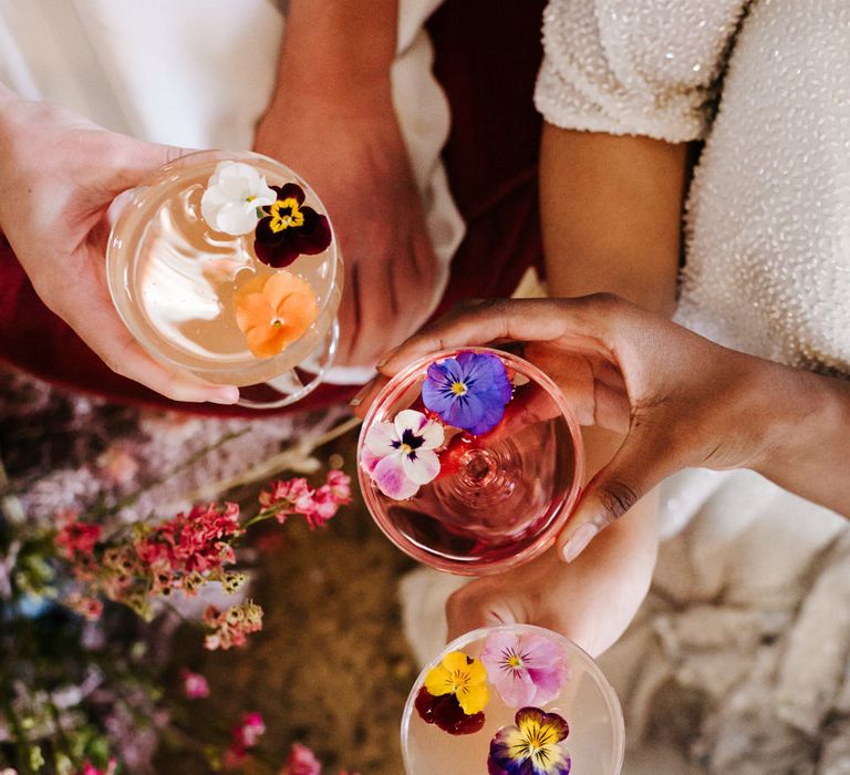 Wedding drinks filled with edible flowers 