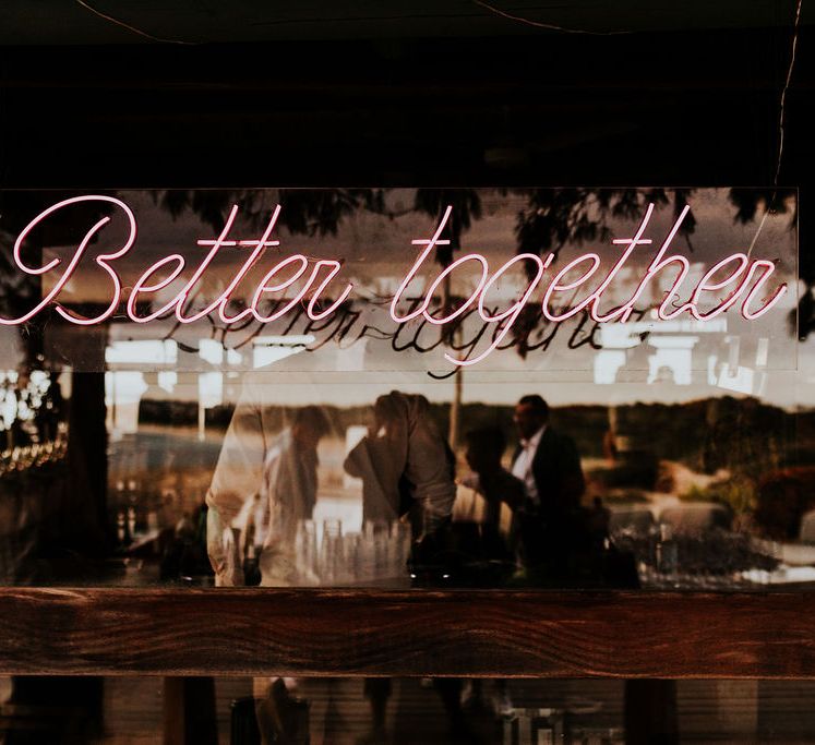 Wedding breakfast decor with pink flowers and pampas grass