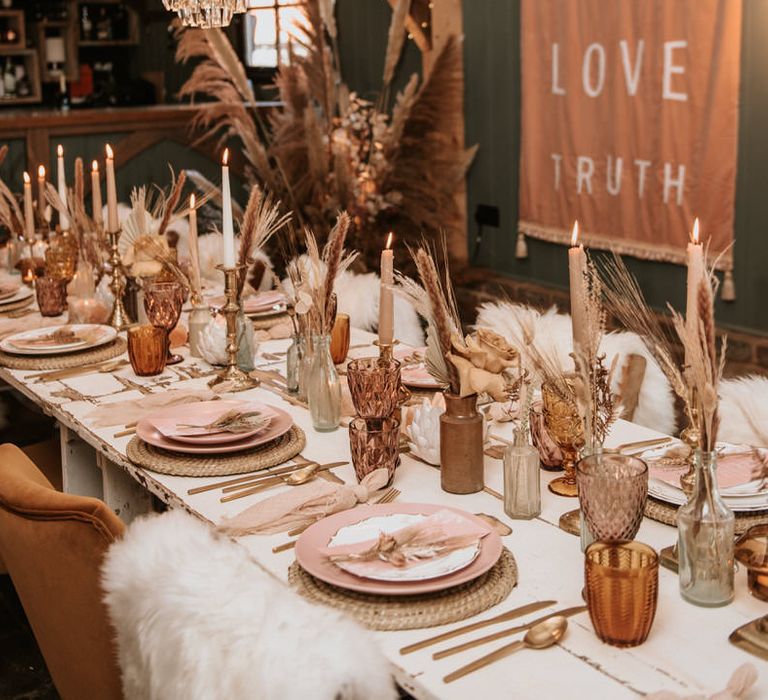 Boho tablescape with shag rug details on chairs