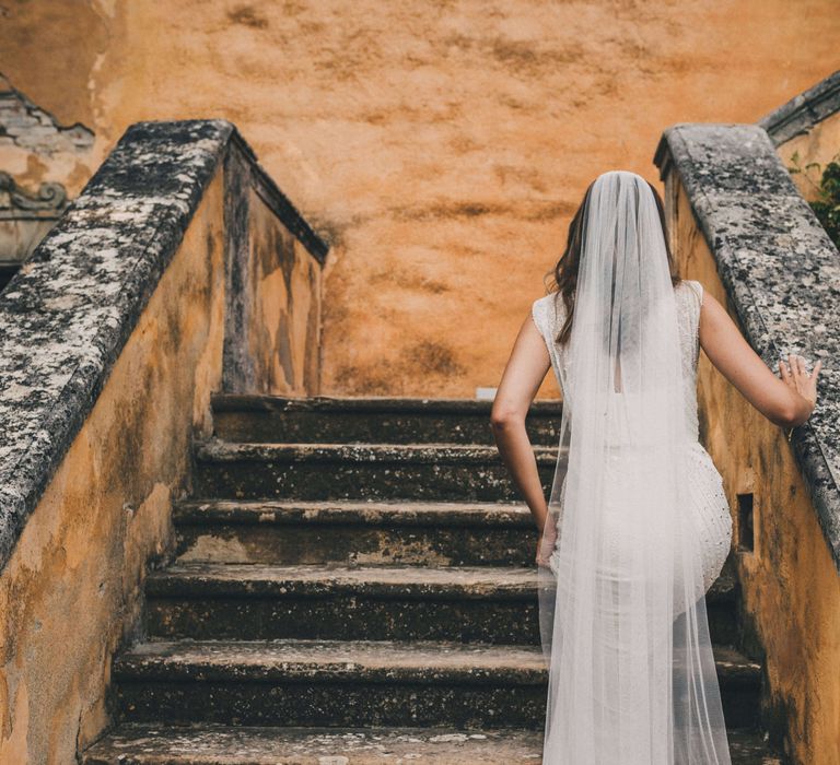 Stunning bridal gown and sweeping veil for Tuscany Italy Wedding