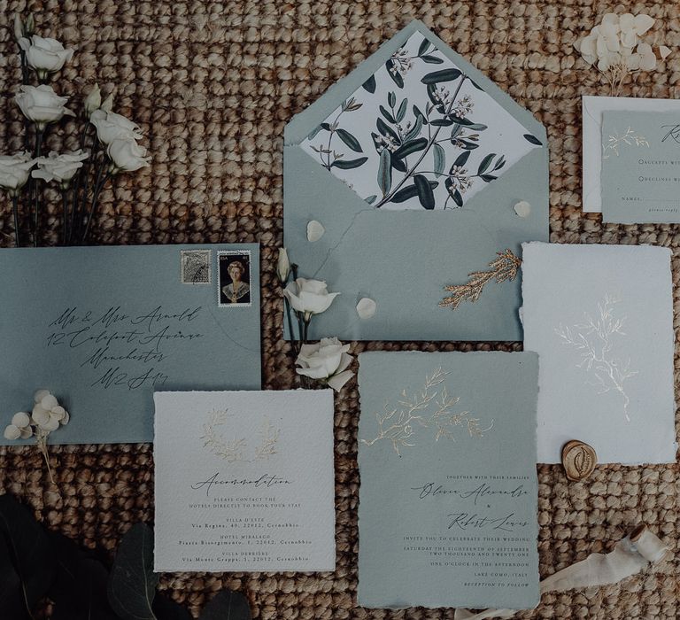 Duck egg blue and gold traditional wedding stationery suite with floral envelope liner 