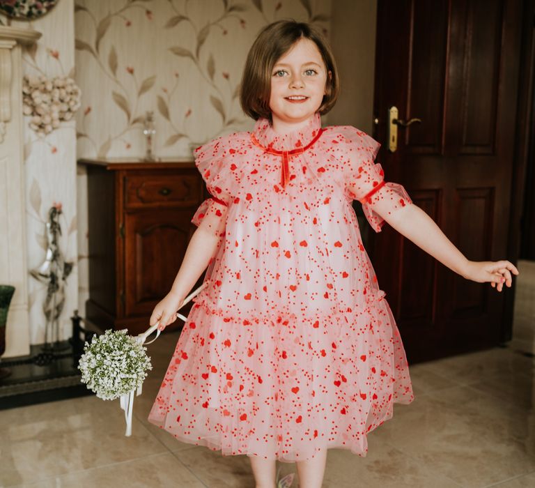 Flower girl in pink tulle dress