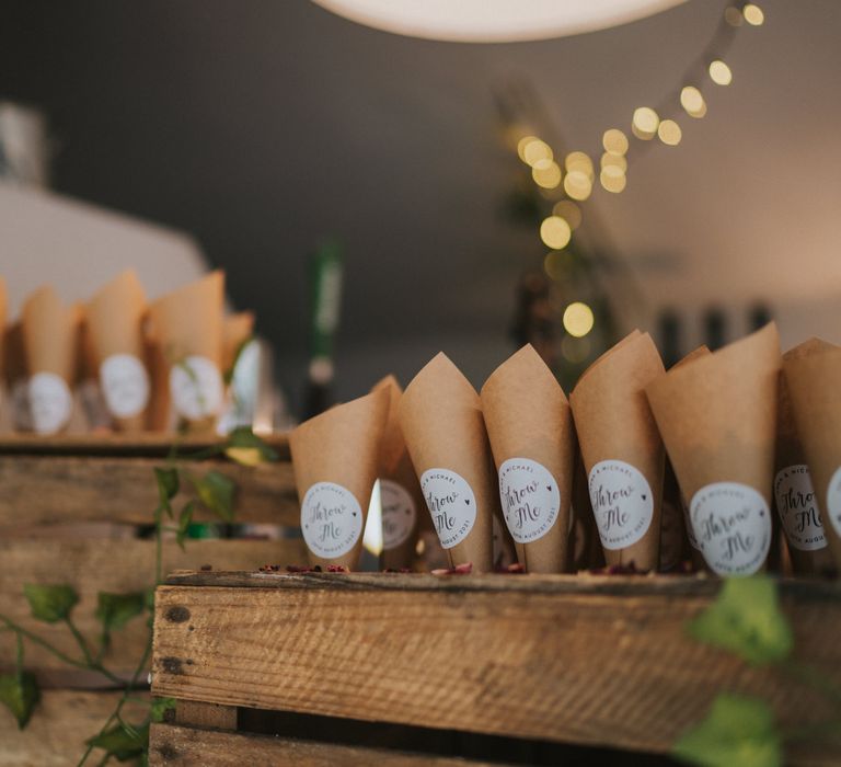 Confetti cones in wooden holders for wedding