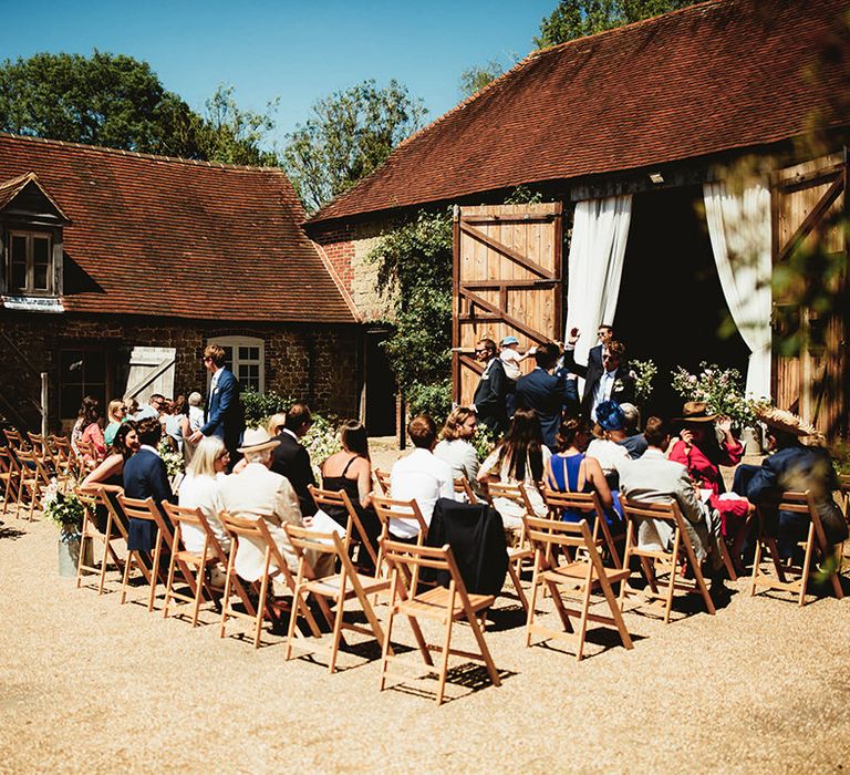 Outdoor wedding ceremony at South Downs National Park home wedding