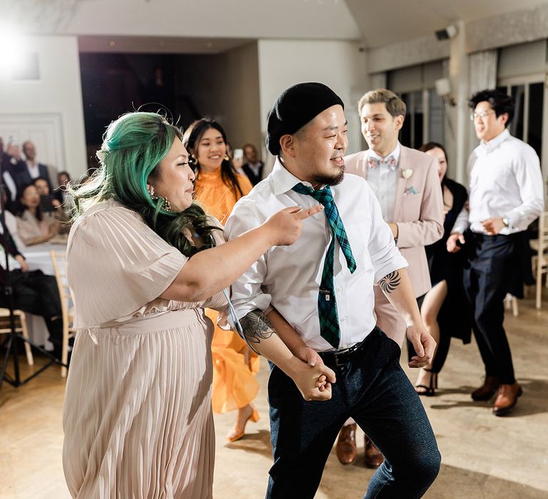 Wedding guests dance during Carlowrie Castle reception