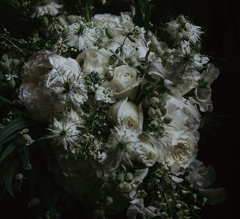 White rose and peony wedding bouquet for the bride 