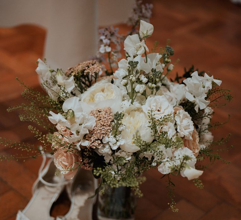 Pale pink and white wedding bouquet for the bride and classic country house wedding 