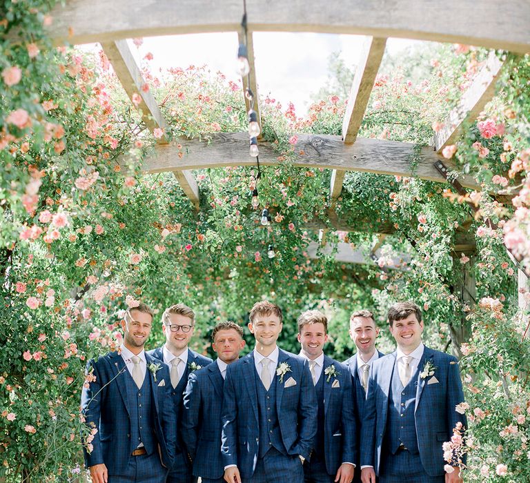 Groomsmen in navy checked suits at Euridge Manor