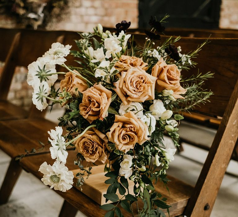 Toffee rose wedding aisle decorations for autumnal October wedding 