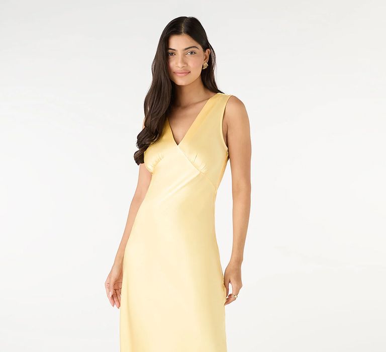 Pale yellow bridesmaid dress from Omnes