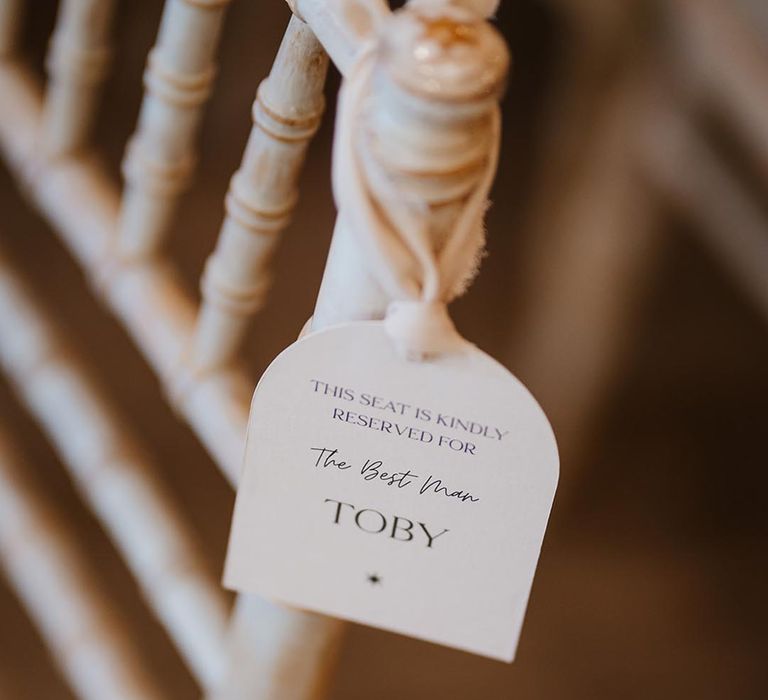 Personalised wedding chair tags to reserve the seats for specific guests 