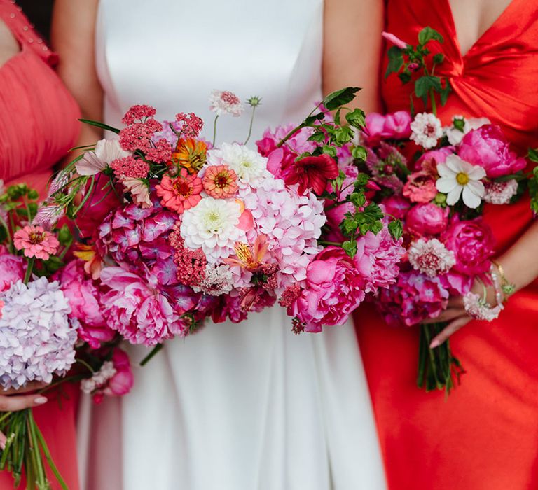 Pink bouquets with hydrangeas and Queen Anne's lace for the bridal party 