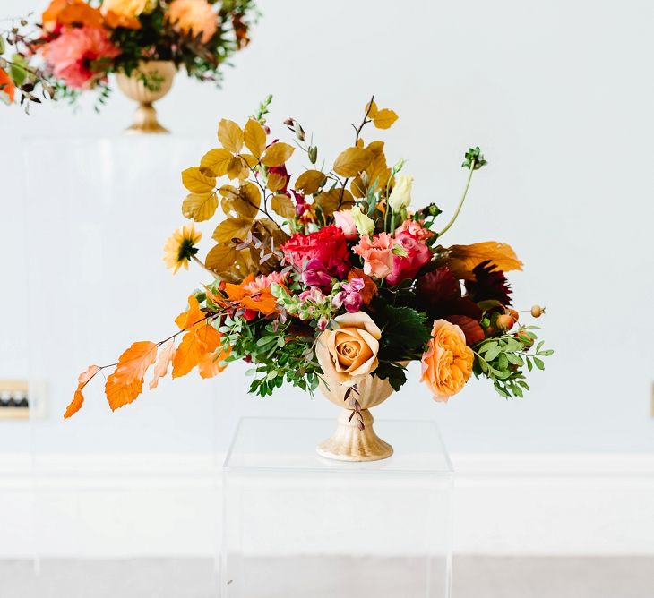 Tall autumn floral arrangement at Carlton House Terrace wedding reception 