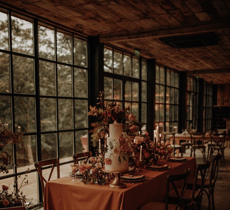 Wedding cake with floral decor at The Hidden River Cabins 