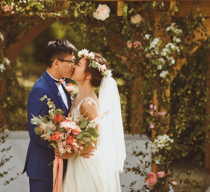 Bride and groom portrait kissing by Matt Penberthy Photography