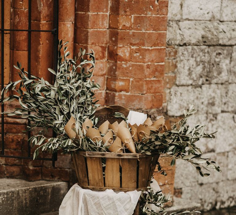 A basket of olive bouquet wedding favours