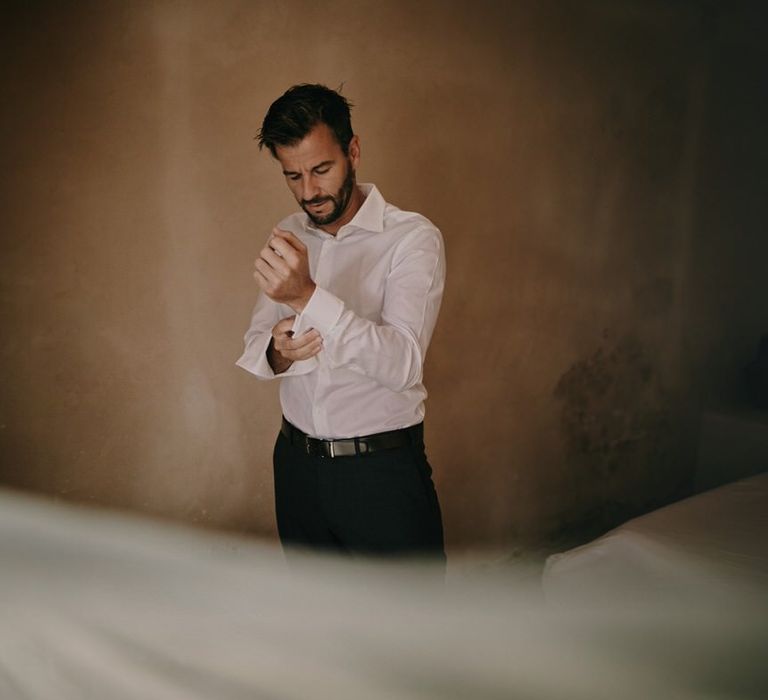 Groom getting ready in his Massimo Dutti suit