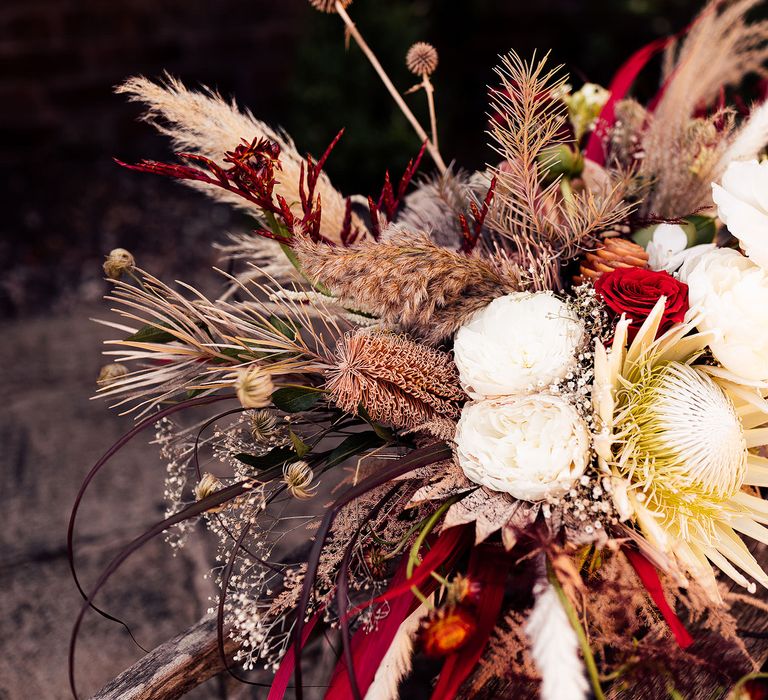 Beautiful large wedding bouquet for bride with red and white florals