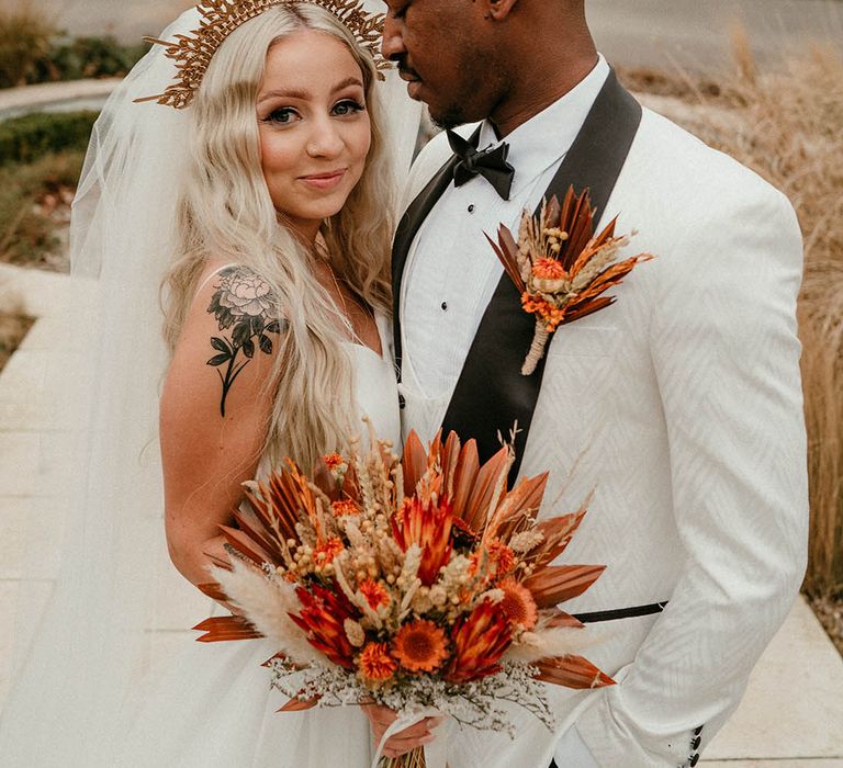 Orange dried flower bouquet and buttonhole