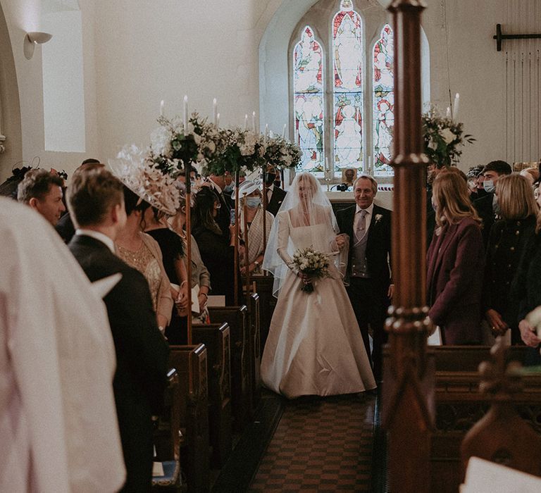 Bride in long white wedding dress with square neck and long veil and groom at Hedsor House wedding