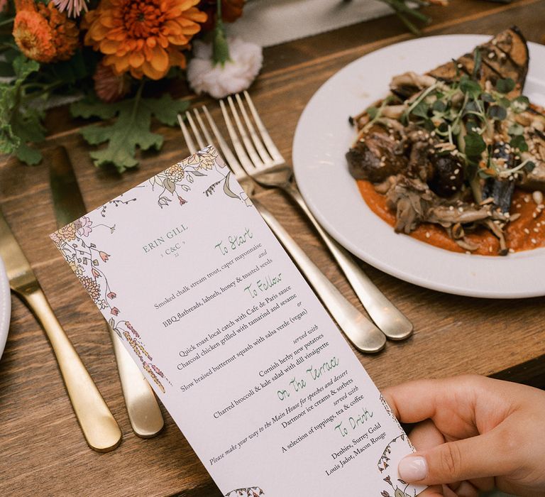 Floral wedding menu with food by Beautiful and the Feast 