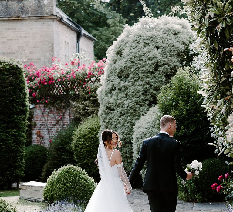 Black and white minimalist Babington House Soho House wedding with the bride and groom having their couple portraits 