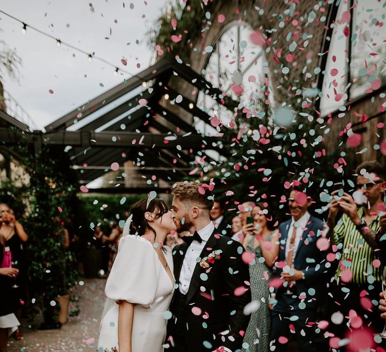 Pink and blue wedding confetti moment at 100 Barrington in London 