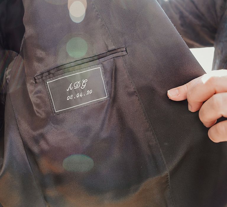 Personalised initials on the groom's suit jacket 