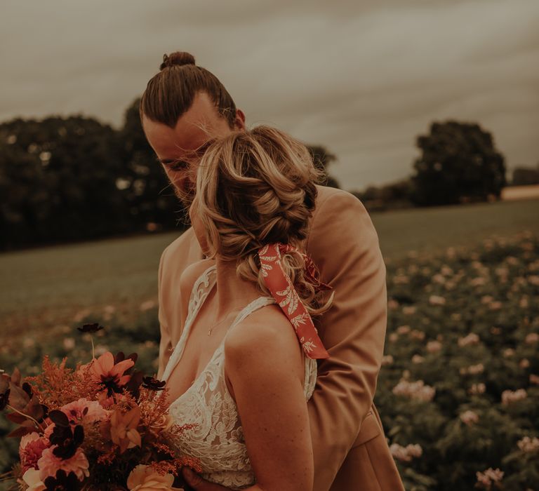 Bridal updo with scarf ribbon 