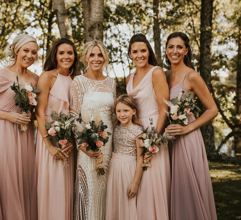 Bridesmaids in pink TH&TH Bridesmaid dresses