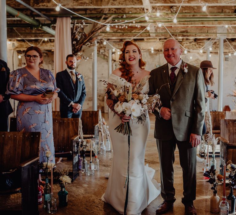 Father of the bride walking his daughter down the aisle at Holmes Mill 