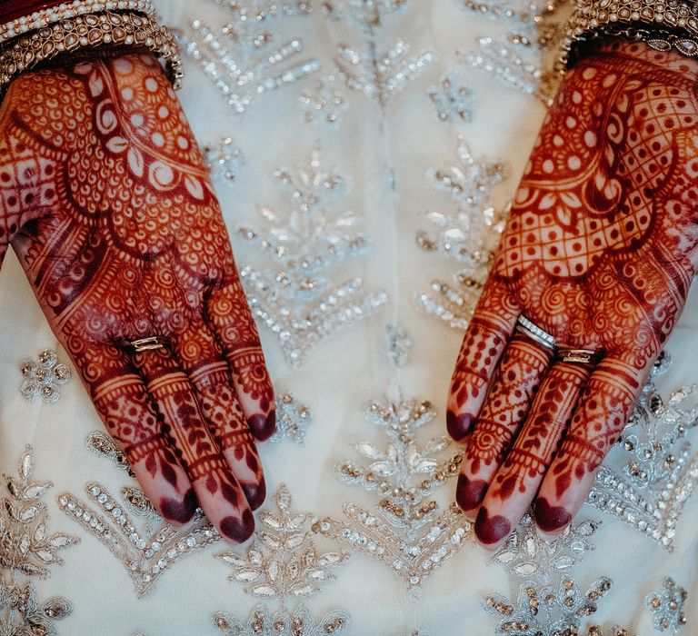 Beautifully intricate Henna covering brides hands