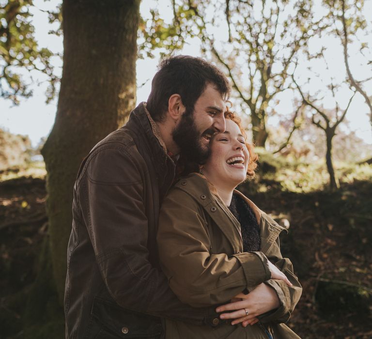 Couple embrace during pre wedding shoot