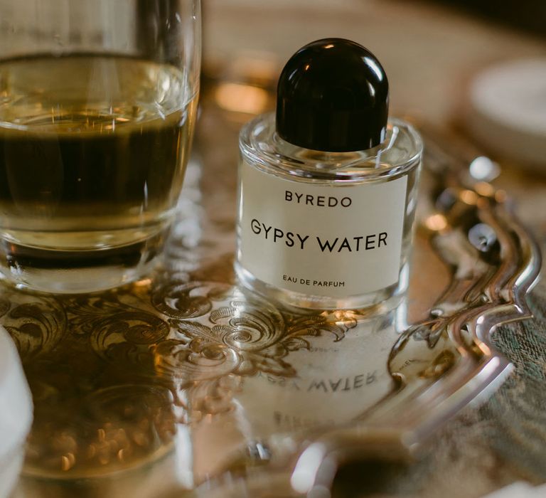 Small bottle of Byredo Gypsy Water eau de perfume on decorative silver platter 