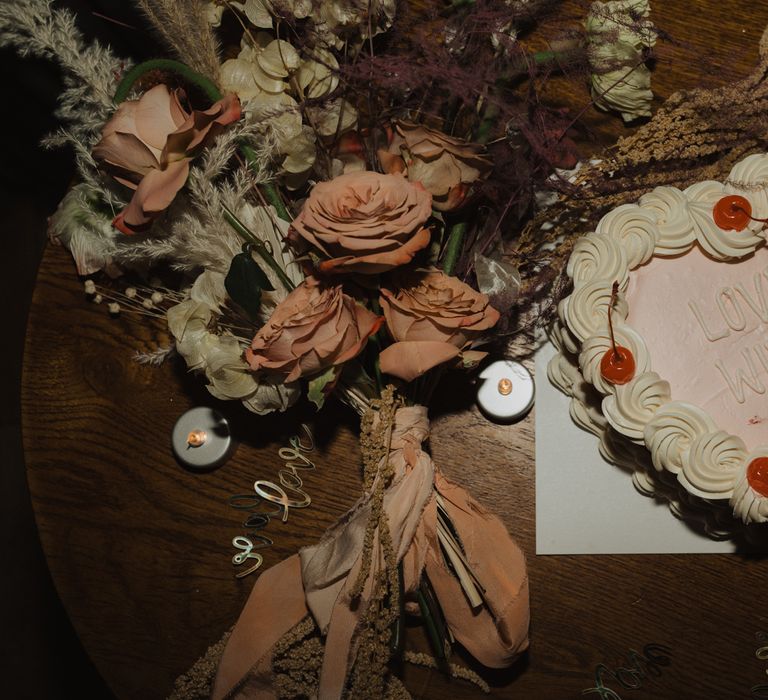 Wedding cake with frosted 'Love Wins'