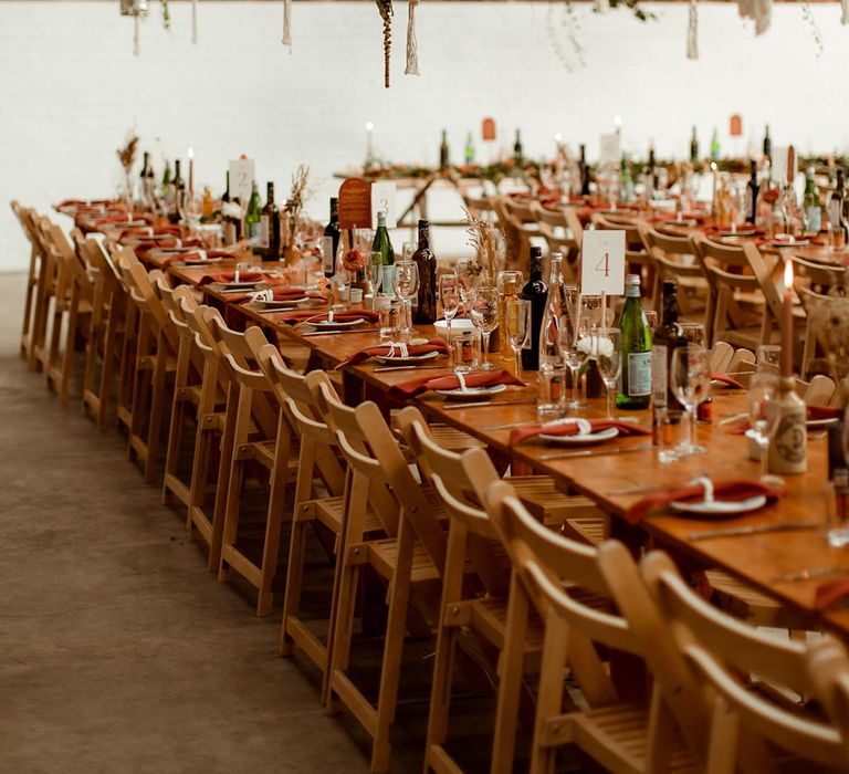 DIY hanging plant decor with macrame details for boho wedding in warehouse wedding venue 