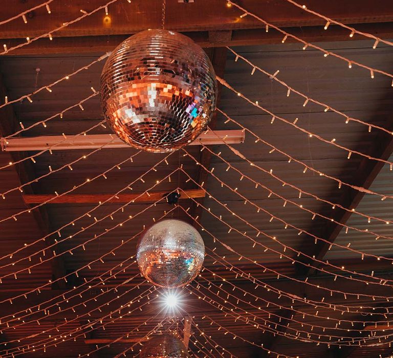 Fairy lights and disco ball decorations for wedding reception 