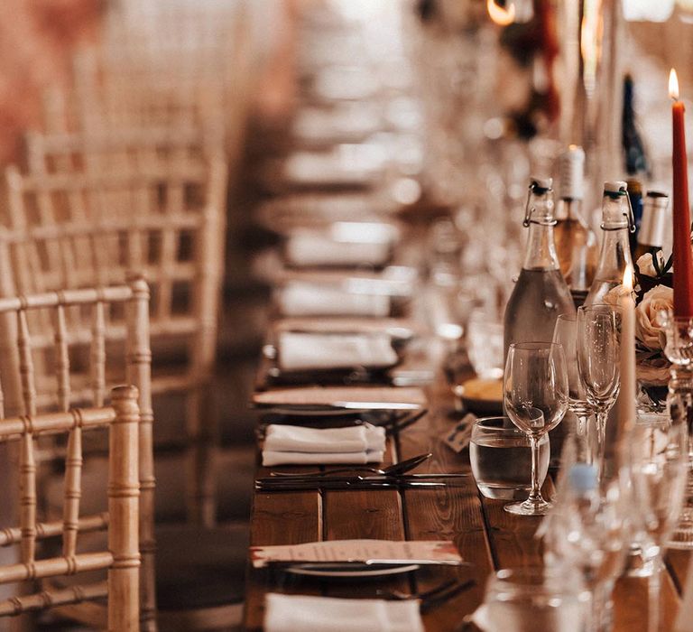 Wedding tablescape at Elmore Court with red taper candles 